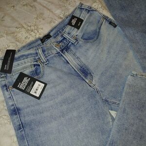 Silver Jeans Eddie Athletic Fit Tapered Leg in Light Blue